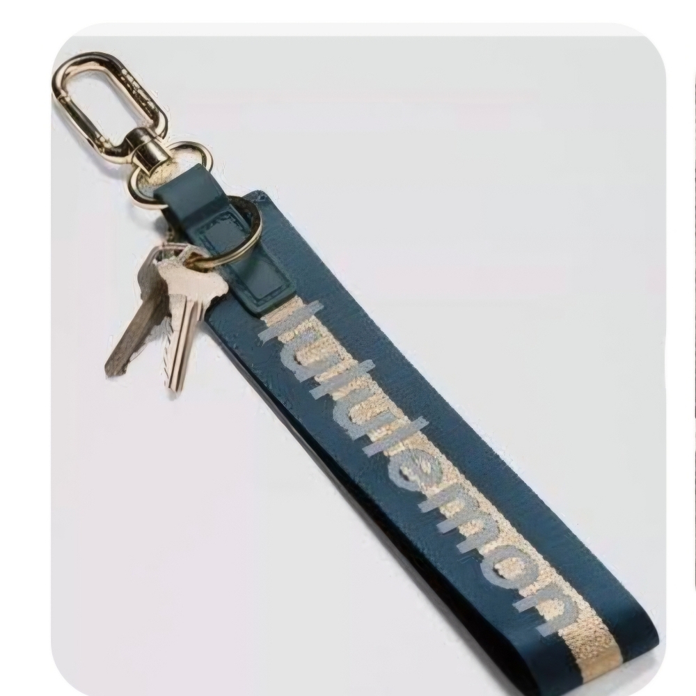 Lululemon Athletica Blue & Gold Never Lost Keychain Brand New!